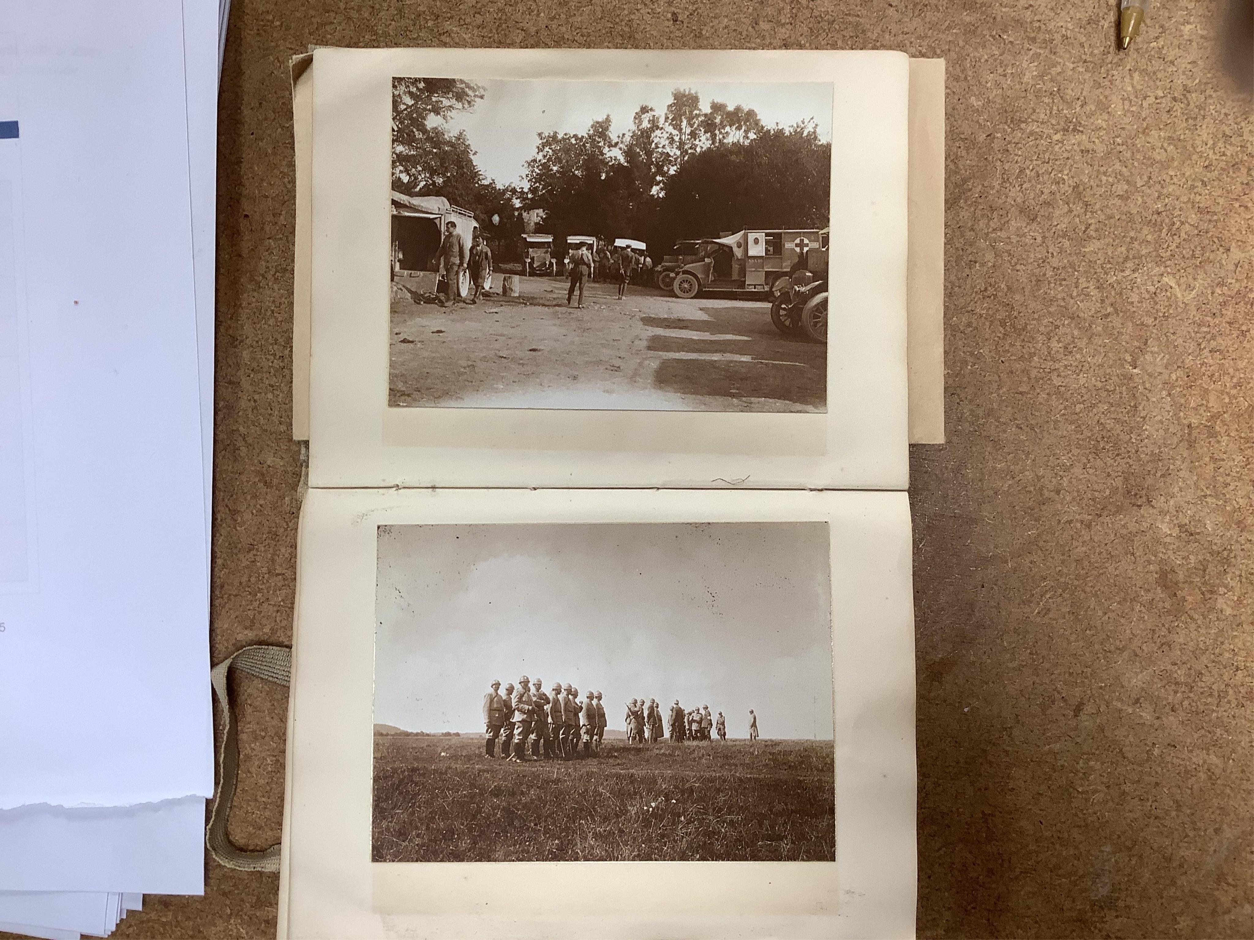 A WWI Ambulance and Balloon Brigade photograph album, pocket watch, coin, etc. Condition - fair, pocket watch ticks when wound